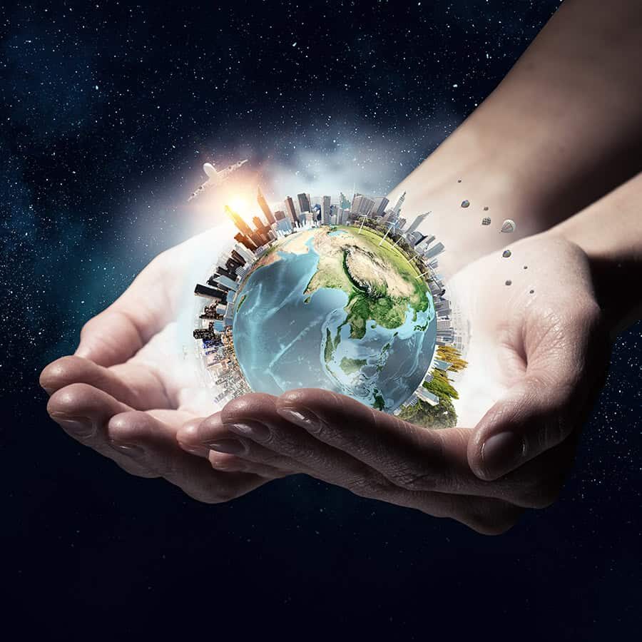 Earth planet in human hands. Elements of this image are furnished by NASA